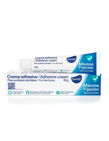Senti2 Crema Adhesiva para Prótesis Dentales 40 gramos, envase blanco y azul, sobre superficie.