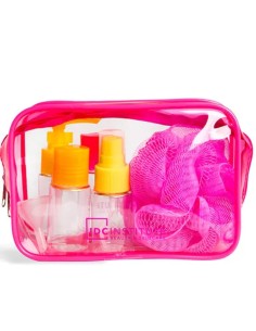 Kit de viaje con 4 frascos rellenables y esponja.