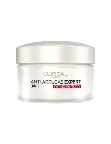 Envase de crema facial L'Oréal con retinol para arrugas