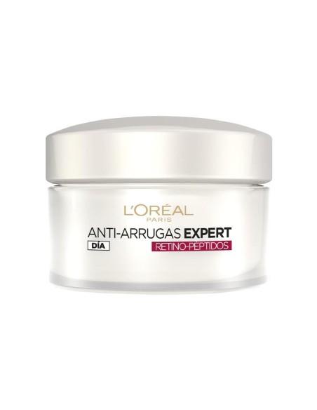 Envase de crema facial L'Oréal con retinol para arrugas