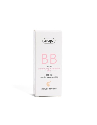Crema facial con color y protección SPF15 tono oscuro.
