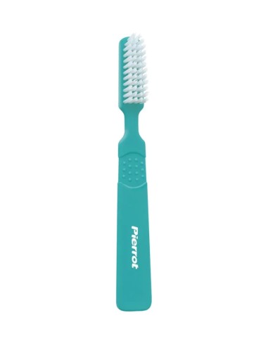 Diseño del cepillo dental para dentaduras postizas Pierrot con filamentos blancos de perfil liso y mango verde menta