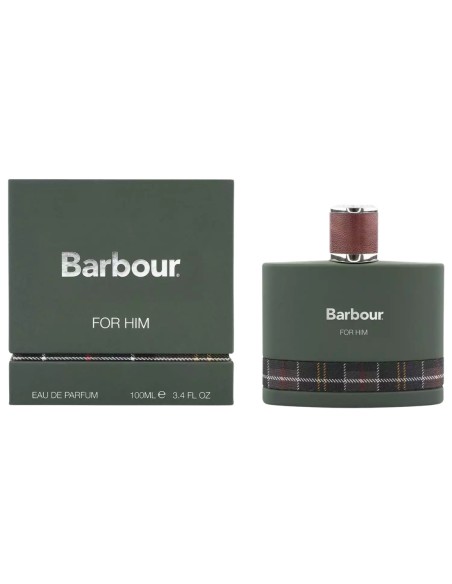 Fragancia para hombre junto a su caja original de color verde con patrón de tartán escocés clásico en la base.