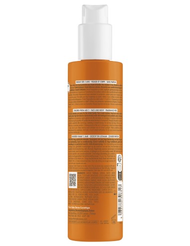Reverso del bote de spray solar Avène Niños mostrando la lista de ingredientes INCI, el código de barras y advertencias.