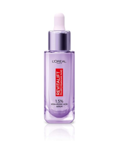 Frasco con cuentagotas de sérum Revitalift Filler junto a su caja violeta